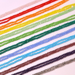 Macro shot of 4mm faceted rainbow crystal rondelle beads for DIY jewelry making