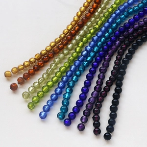 Macro view of assorted colorful crystal glass beads for DIY jewelry making and crafting
