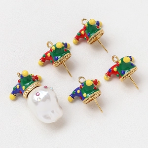 Detail of baroque pearl joker hat charm with colorful enamel and crystal inlays