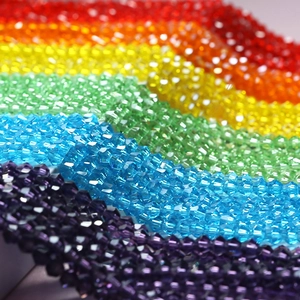 Macro view of 4mm faceted rainbow crystal glass beads for DIY jewelry making