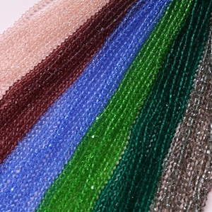 Macro view of 4mm faceted glass wheel beads in multiple colors for DIY jewelry making
