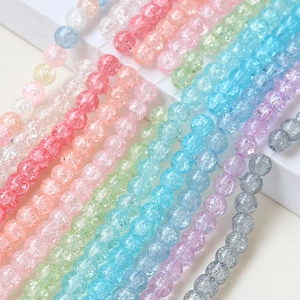 Macro shot of colorful crackled glass beads for DIY jewelry making and crafting