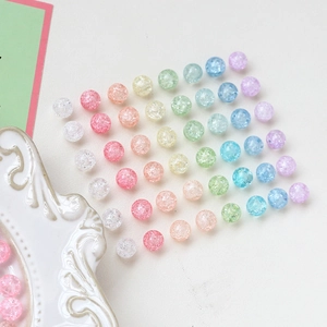 Macro view of macaron colored crackle glass beads for DIY jewelry making and accessories