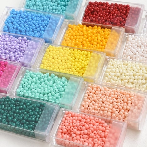 Colorful 3mm macaron glass seed beads in transparent storage boxes for DIY jewelry