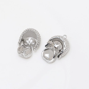 Detailed silver pearl bail pendant charms with intricate grain texture and top hanging loops