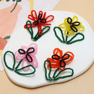 Handmade beaded flower charms in assorted colors for DIY jewelry making accessories