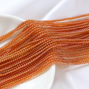 Macro de perles de verre irisées orange de 2 mm pour la création de bijoux et l'artisanat