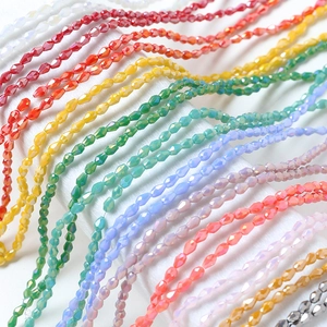 Colorful faceted teardrop glass beads for DIY jewelry making in macaron color gradients