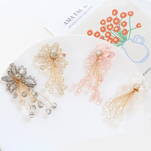 Exquisite handmade crystal beaded flower pendants with tassel details in four colors