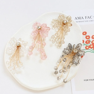 Handmade beaded flower pendants with crystals and gold tassels in four soft colors