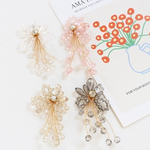 Handmade beaded flower earrings with crystal petals and gold tassel fringe pendants