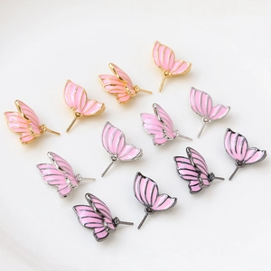 Gold plated butterfly wing earring charms with pink enamel and baroque pearl details