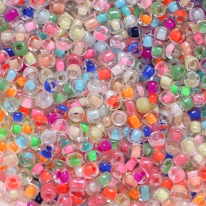 Macro shot of 4mm macaron glass seed beads for DIY jewelry making and embroidery craft
