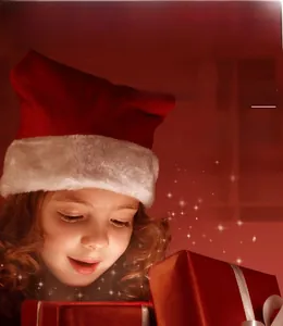 Child model opening a glowing red Christmas gift box wearing a plush Santa hat