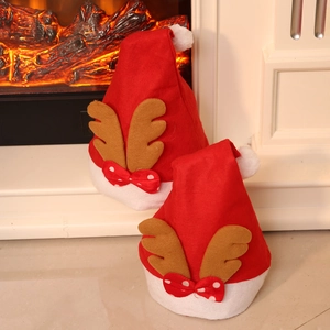 Classic red and white Christmas hats with 3D reindeer antlers for festive holiday decor