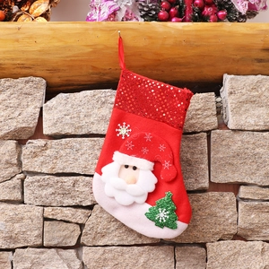 Classic red sequin Christmas stocking with Santa Claus applique and snowflake embroidery