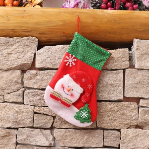 Festive red velvet Christmas stocking with green sequins and a 3D snowman character