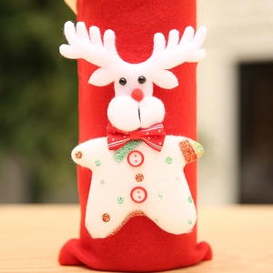 Detailed close-up of a Christmas reindeer wine bottle cover made of soft red felt material