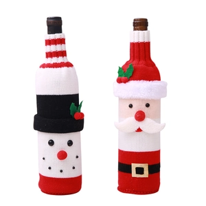 Knitted Christmas wine bottle covers featuring Santa Claus and Snowman designs