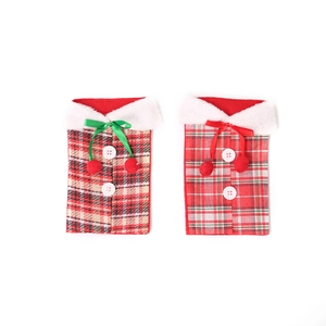 Christmas plaid wine bottle covers with white faux fur collars and festive ribbon bows