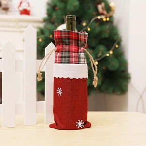 Christmas burlap wine bottle cover with red plaid pattern and snowflake decorations