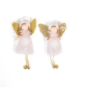 Close-up of white lace Christmas angel dolls with gold wings and jingling bells