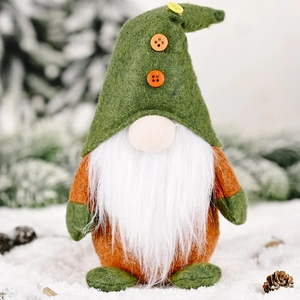 Standing Christmas gnome with green hat and white beard in a cozy winter setting