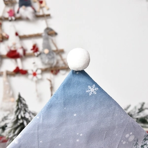 Blue and white gradient Christmas hat with snowflake patterns and soft velvet texture