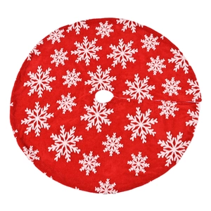 Classic red Christmas tree skirt with white snowflake patterns and plush finish