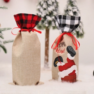 Red and black plaid burlap Christmas wine bottle bags with Santa chimney prints
