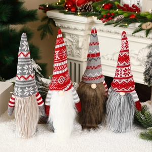 Detailed view of four Christmas gnome wine bottle covers with knitted hats and faux fur beards
