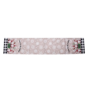 Christmas table runner with gnomes and snowflakes in red, green and buffalo plaid