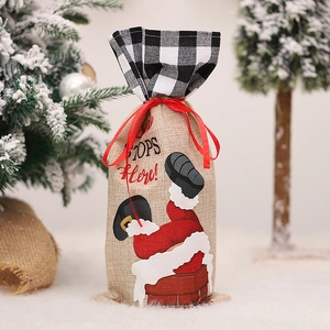 Santa Claus chimney burlap wine bottle bag with black plaid trim and red silk ribbon