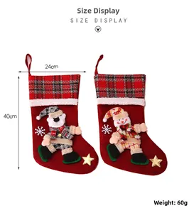 Detailed view of large Christmas stockings with snowman and bear motifs, size 40cm by 24cm