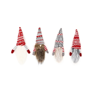Set of four knitted Christmas gnome wine bottle covers with long beards and snowflake caps