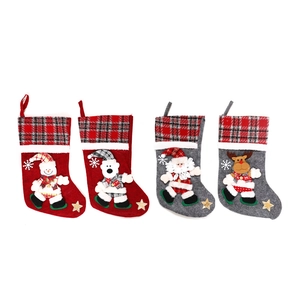 Set of 4 large Christmas stockings with 3D Santa, Snowman, Polar Bear, and Reindeer motifs
