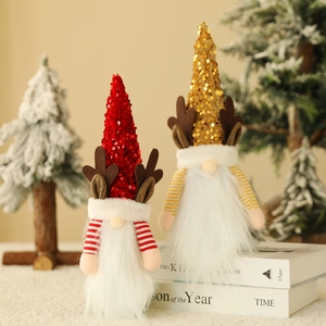 Detail of Christmas gnomes with sequin hats and reindeer antlers on a holiday table