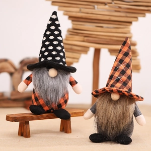 Set of Halloween gnomes with black dots and plaid hats for autumn home decoration