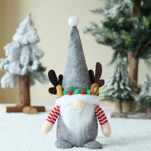 Christmas gnome doll decoration with grey reindeer antlers and a long white beard