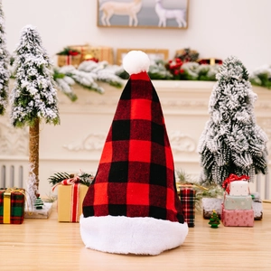 Classic red and black buffalo plaid Christmas hat with white plush trim and pom pom