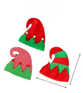 Detailed view of three festive Christmas elf hats with bells and soft pom-poms