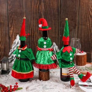 Christmas elf wine bottle covers set with bells and festive red green velvet patterns