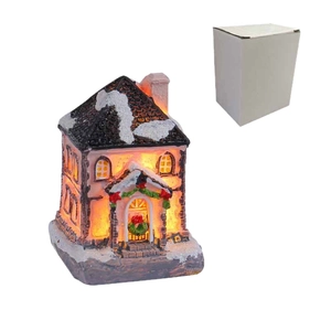 Luminous Christmas resin house with warm LED lights and snow textures on white background