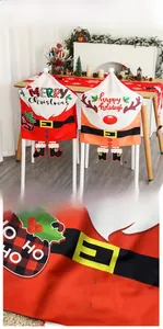 Detail of Christmas chair covers featuring Santa Claus and elk patterns with 3D leg accents
