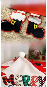 Close-up of Christmas chair cover with Santa boot applique, dense stitching and fluffy pompom
