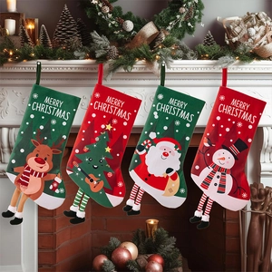 Detail of four festive Christmas stockings with hanging legs and Merry Christmas print