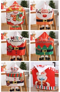 Detail showing various Christmas chair covers with Santa and snowman festive prints
