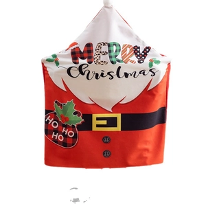Christmas chair cover featuring Santa Claus design with red and white festive prints