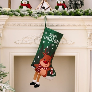 Christmas stocking with hanging legs and cartoon reindeer decor on festive fireplace