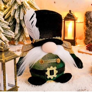 Standing Christmas nutcracker gnome doll with velvet fabric and golden accents on snow background